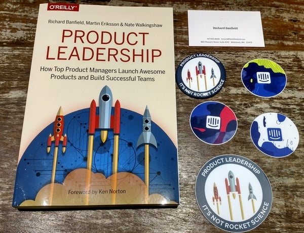 Product Leadership Book and Intercom stickers